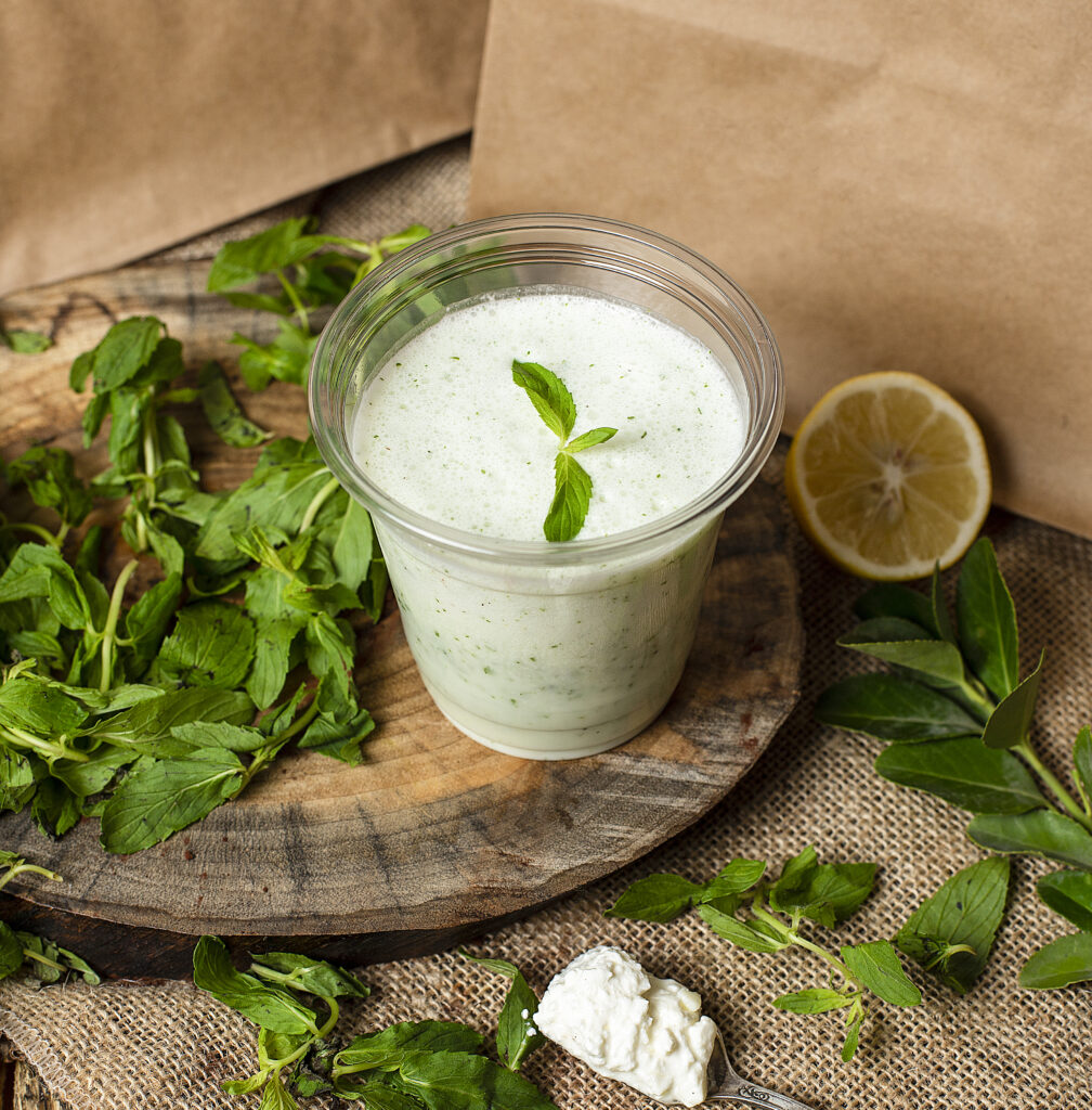 Refreshing cold yogurt shake with herbs and mint, ayran.