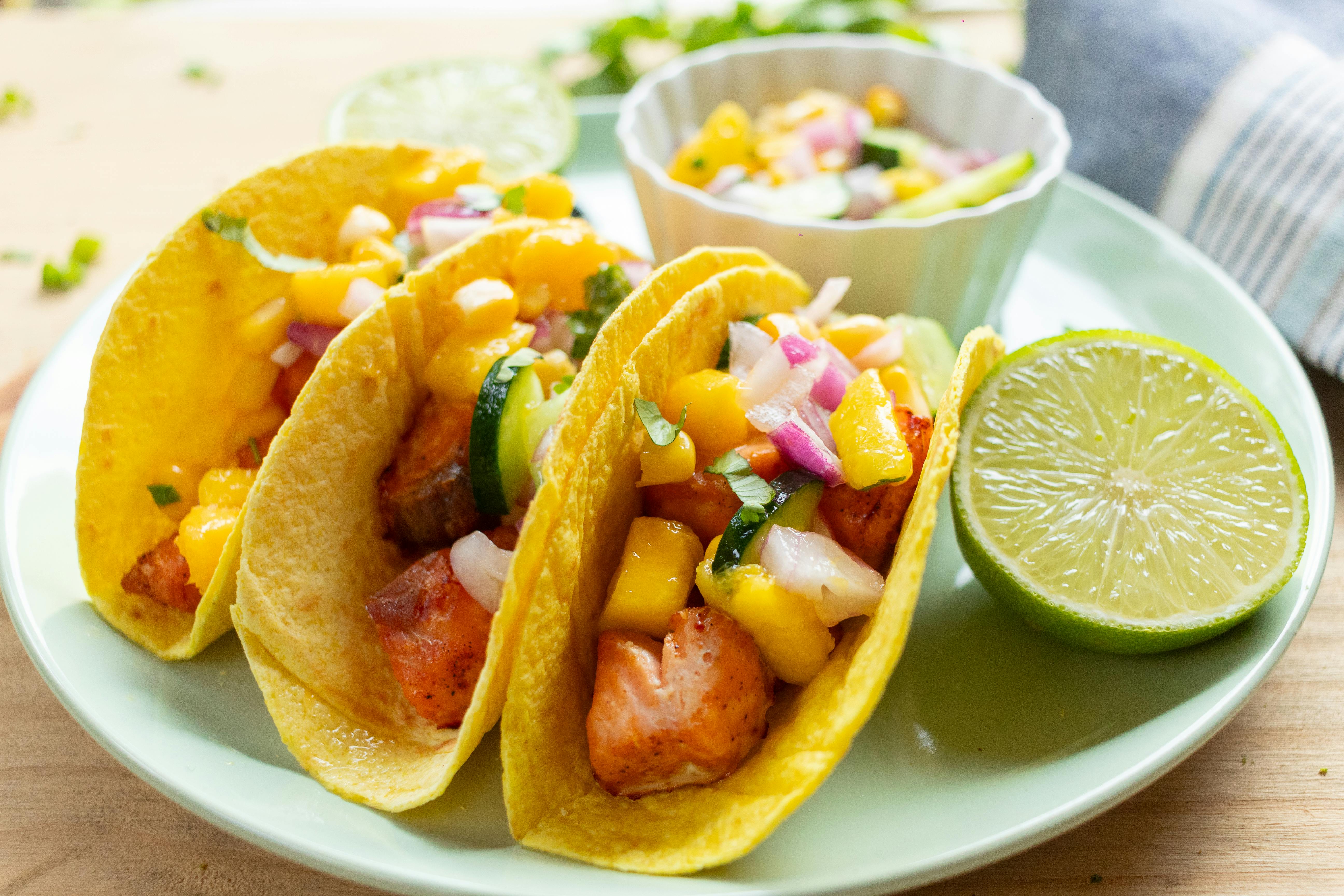 Salmon Tacos with Mango Salsa, Cucumber & Sweet Corn